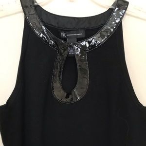 Sleeveless top with neck detail